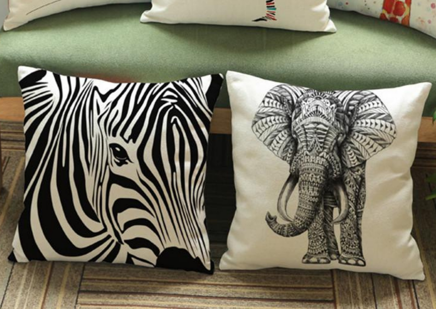 Part of our African homeware range, our animal decorative cushion is a beautiful addition to your home. The white cushion with graphics of zebras, giraffes and elephants, is the perfects sofa cushion and chair cushion.