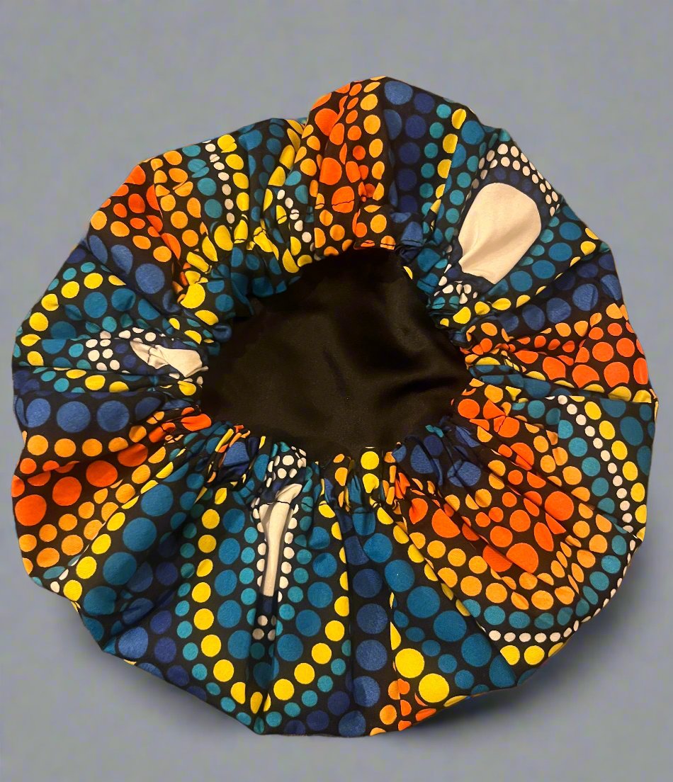 The Buki Ankara African Print Satin Sleeping Bonnet in Yellow, Orange & Blue by Eldimaa Fashion