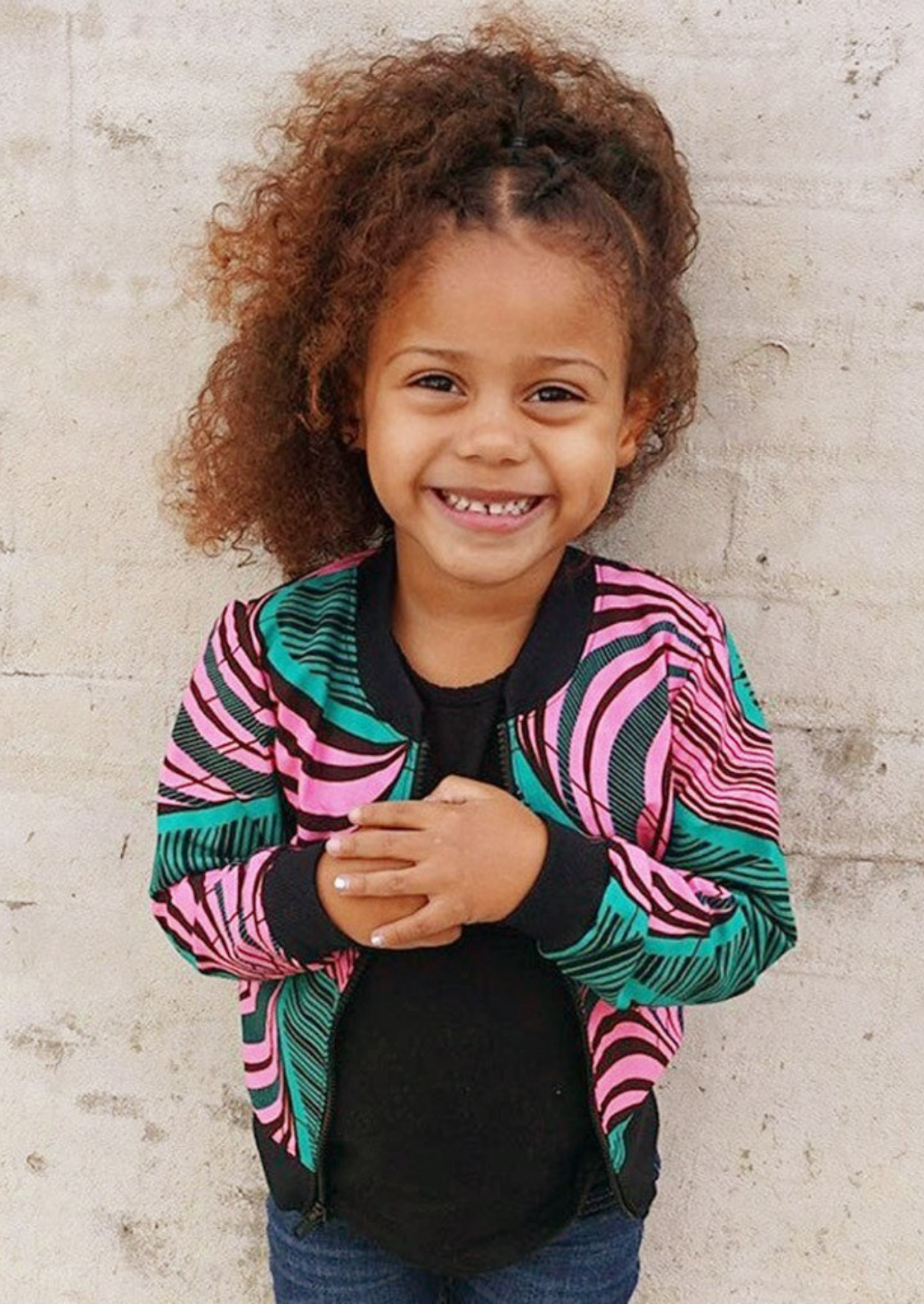 Pink and turquoise African print bomber jacket for girls.