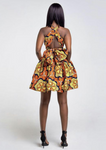 An orange multi way wrap dress, The Lola, is a versatile African print dress that can be styled to match your mood or the occasion. The Ankara style dress can be worn as a chic halter neck midi dress, a sleeveless v neck dress, a wrap dress, a bandeau midi dress, a cross front dress and more. The orange midi dress is perfect for work and social occasions and the wrap skater dress is made to measure.