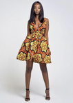 An orange multi way wrap dress, The Lola, is a versatile African print dress that can be styled to match your mood or the occasion. The Ankara style dress can be worn as a chic halter neck midi dress, a sleeveless v neck dress, a wrap dress, a bandeau midi dress, a cross front dress and more. The orange midi dress is perfect for work and social occasions and the wrap skater dress is made to measure.