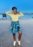 Blue African print a-line skirt for girls, with pink and yellow patterning.