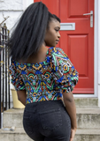 A blue off shoulder top, The Bola, with its striking African print brings a unique Ankara style blue bardot top to your wardrobe. The African print top with bardot neckline is the perfect long sleeve summer top, transcending seasons to provide you with an off shoulder blouse for all year round.