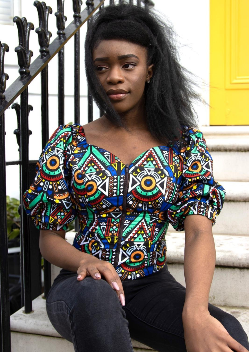 A blue off shoulder top, The Bola, with its striking African print brings a unique Ankara style blue bardot top to your wardrobe. The African print top with bardot neckline is the perfect long sleeve summer top, transcending seasons to provide you with an off shoulder blouse for all year round.