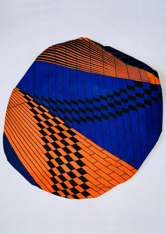 African print satin bonnet, the royal blue, bright orange and black print makes a beautiful sleeping cap.
