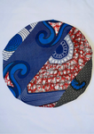 African print bonnet in red and blue with a satin lining.