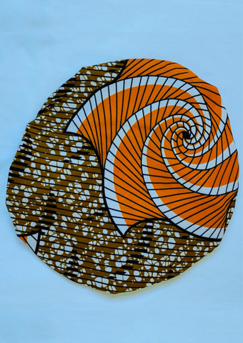 Brown and Orange African Print Bonnet with splashes of white.