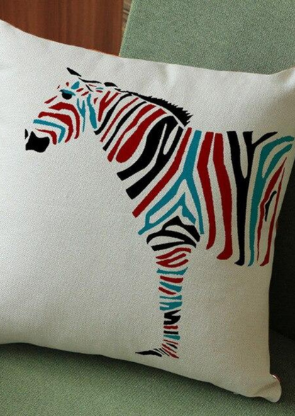 The colourful zebra graphic on a white cushion is part of our beautiful African inspired decor range. The African homeware adds vibrancy to your home, the knitted cotton making the knitted cushion cover cosy and perfect for snuggling into. The ideal sofa cushion and chair cushion, the statement decorative cushion is a great addition to your home.