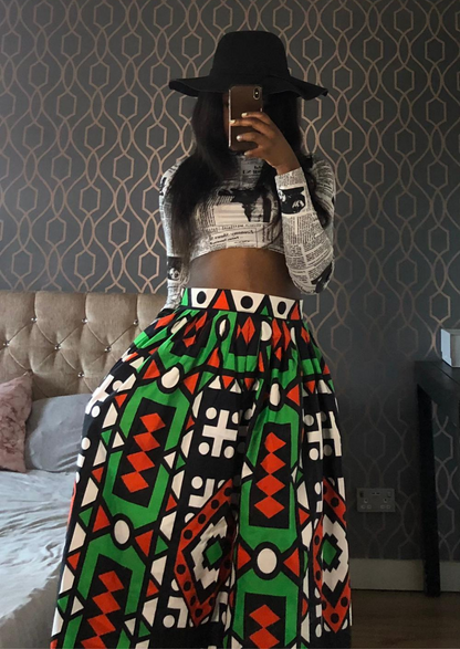 African print maxi skirt with green, red, black and white patterning.