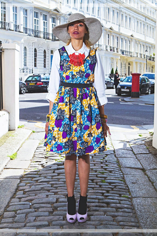 The Folu in purple is a vibrant Ankara style African print skirt, with gorgeous hues of purple, blue and yellow, making the pleated midi skirt a bright addition to your wardrobe. The floral midi skirt is the perfect summer skirt, the mid length making it perfect for dressing up or down.
