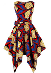 The Abi is a red and blue high low dress that can also be worn as a dress top over leggings. The asymmetric dress is a sleeveless dress and a round neck dress. The Ankara Style African dress can be dressed up or down for any occasion.