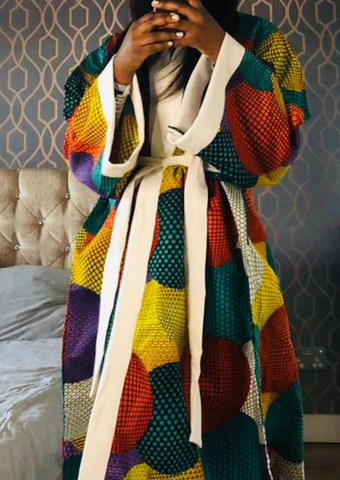 Multicoloured African print kimono for women. The kimono is lined and has a belt.