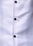 White button up men's shirt with African print detailing. The Lekan in white comprises of a white shirt, enhanced by kente print sleeves, collar and pocket.