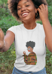 Women's white short sleeve t-shirt with graphic of woman wearing African print.